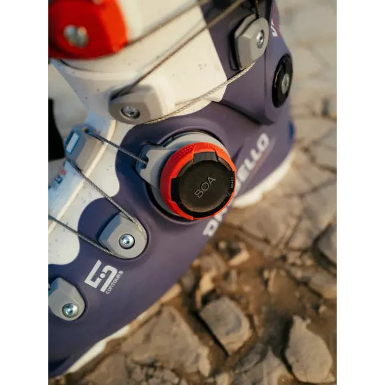 BOA dial and buckle detail on a Dalbello Veloce Space boot, photographed on rock
