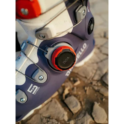 BOA dial and buckle detail on a Dalbello Veloce Space boot, photographed on rock