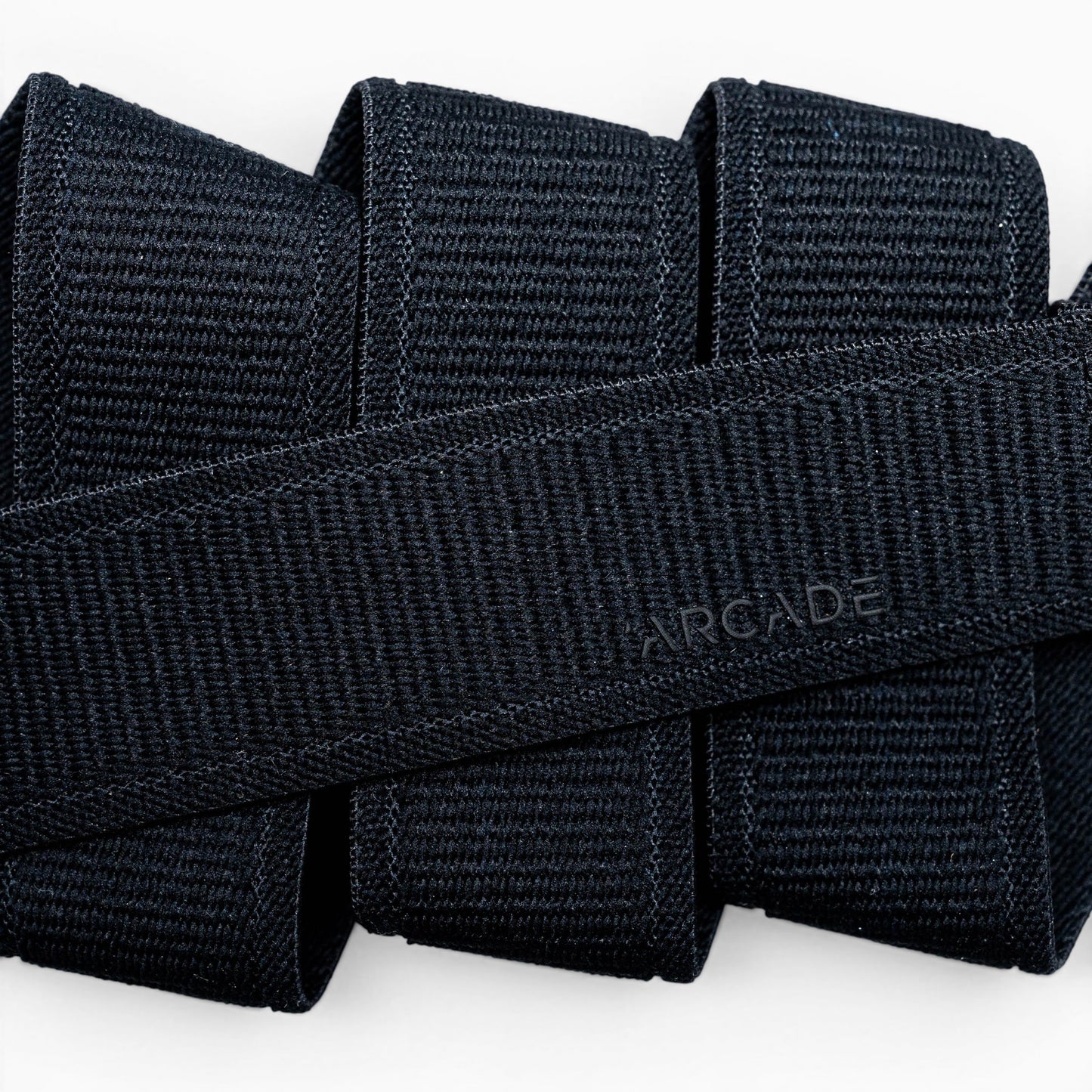 Arcade Atlas Youth Belt in Black — webbing texture close-up