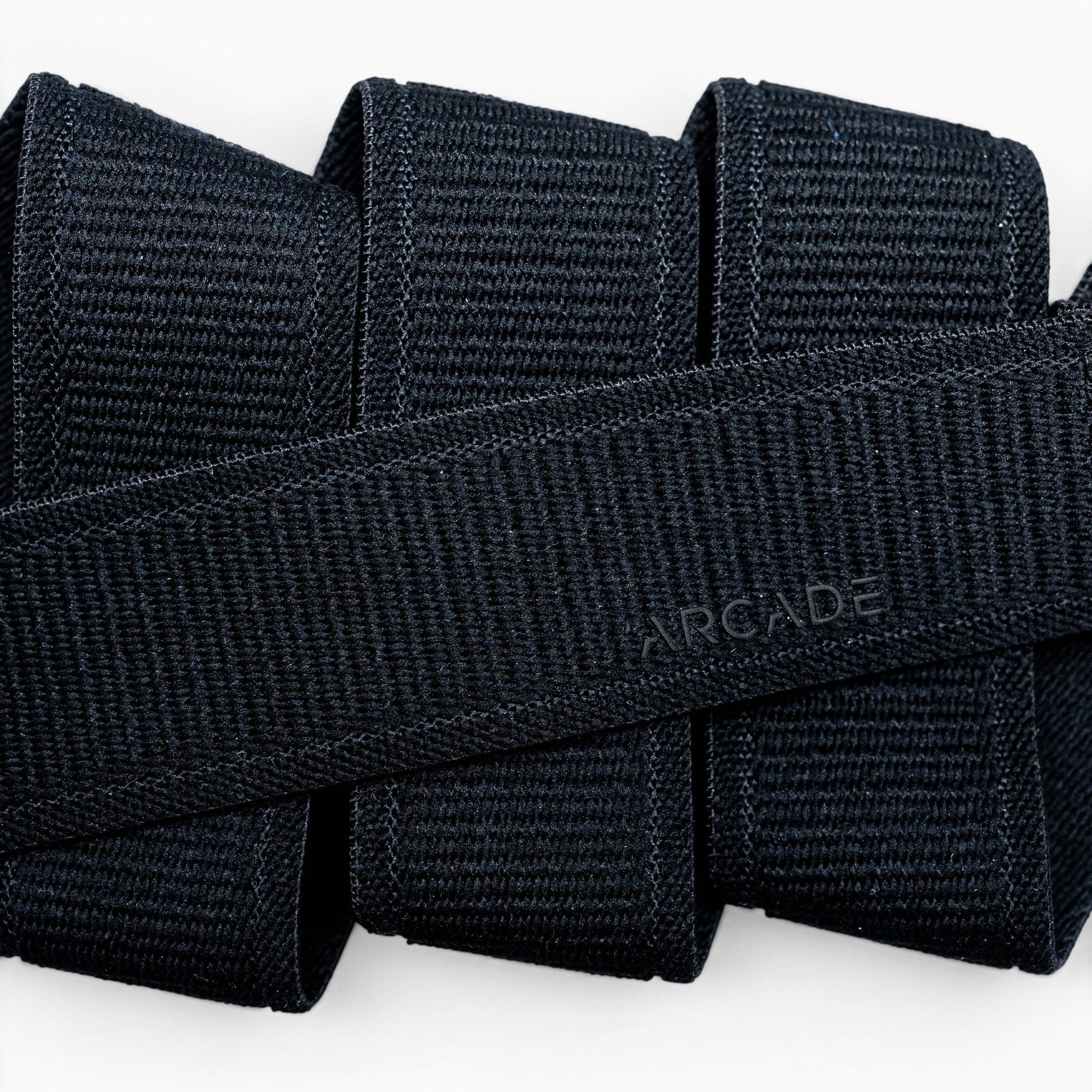 Arcade Atlas Youth Belt in Black — webbing texture close-up