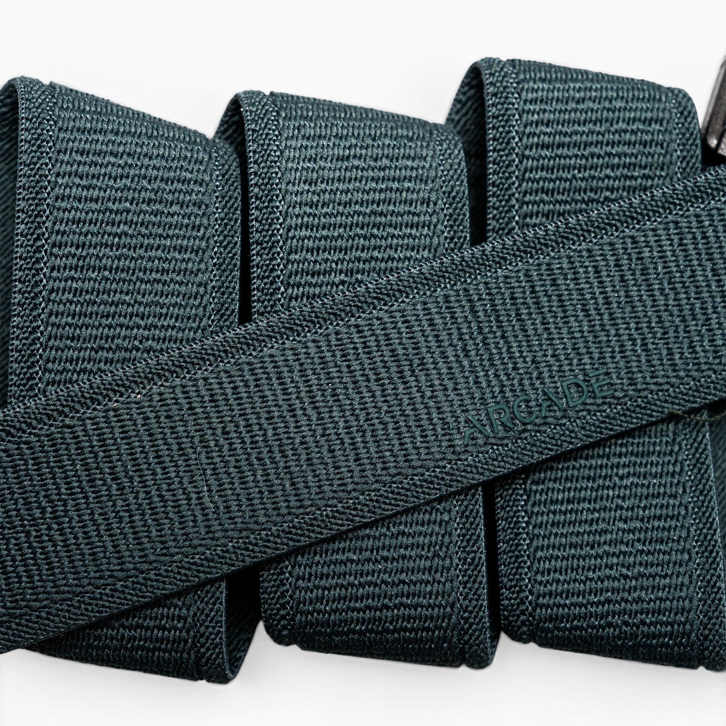 Arcade Atlas Youth Belt in Jalapeno — webbing texture close-up