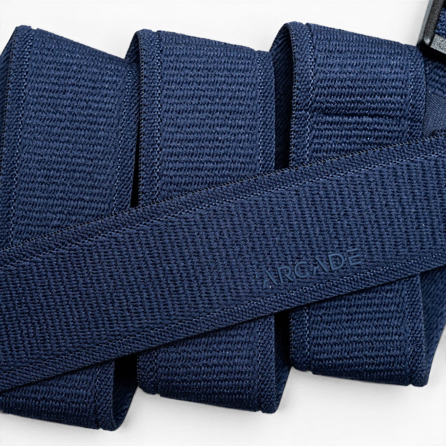 Arcade Atlas Youth Belt in Navy — webbing texture close-up