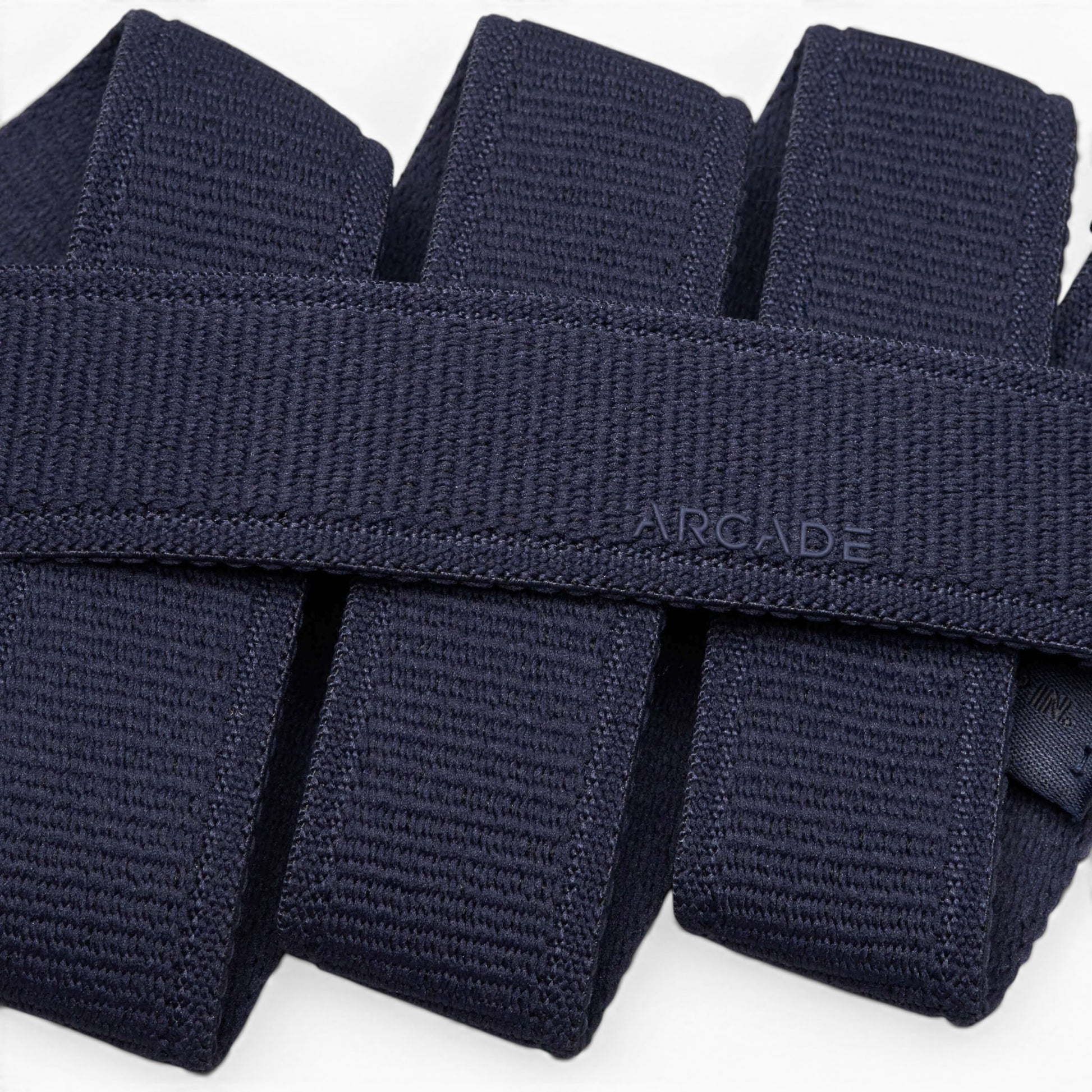 Arcade Atlas Slim Belt in Navy — Arcade logo patch