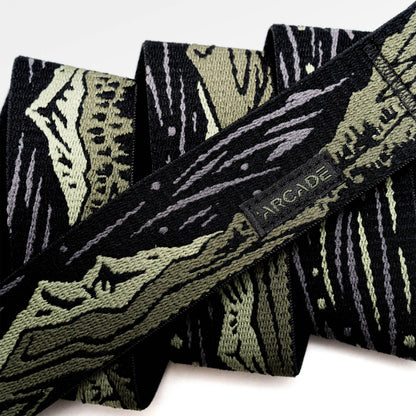 Arcade Out of Range Belt in Ivy Green — webbing texture close-up